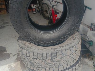 4 Falken Wildpeak A/T tires size LT285/70R17.