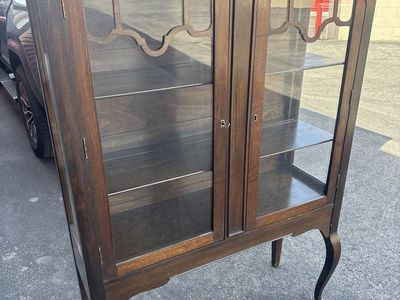Antique Empire Furniture Company china cabinet - Huntington, West Virginia.
