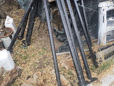 Black vinyl coated fencing with all parts. Surface mount with gate.