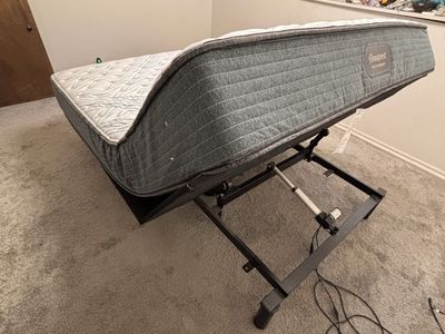 Queen bed frame with automatic elevating upper section