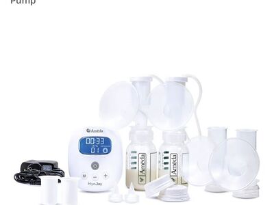 New Ameda Breast Pump + New Pumping bra + New pack
