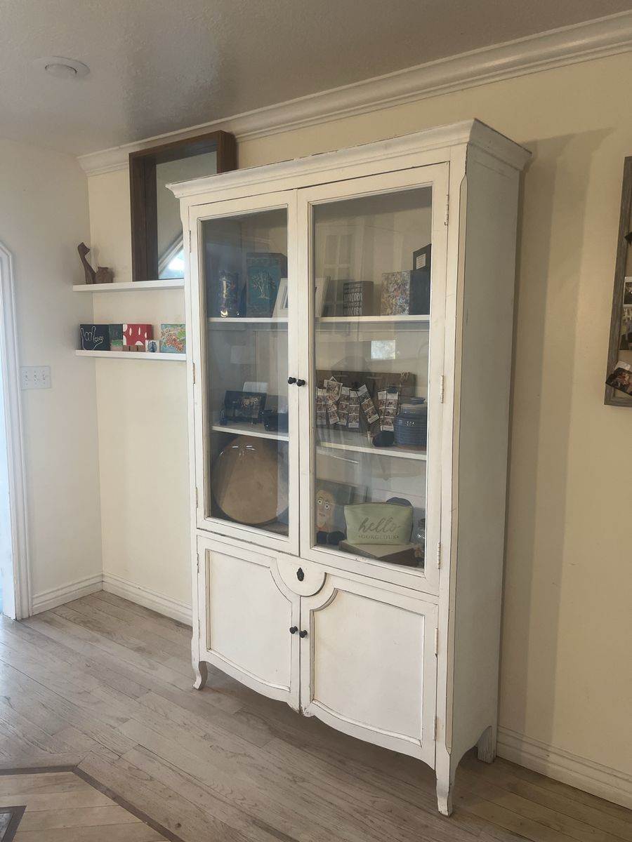 White Wooden Display Cabinet with Glass Doors and Storage Base