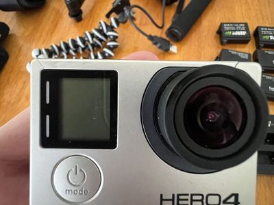 GoPro Silver Hero 4 w/Carry Case, 5 Batteries, Mounts and Accessories