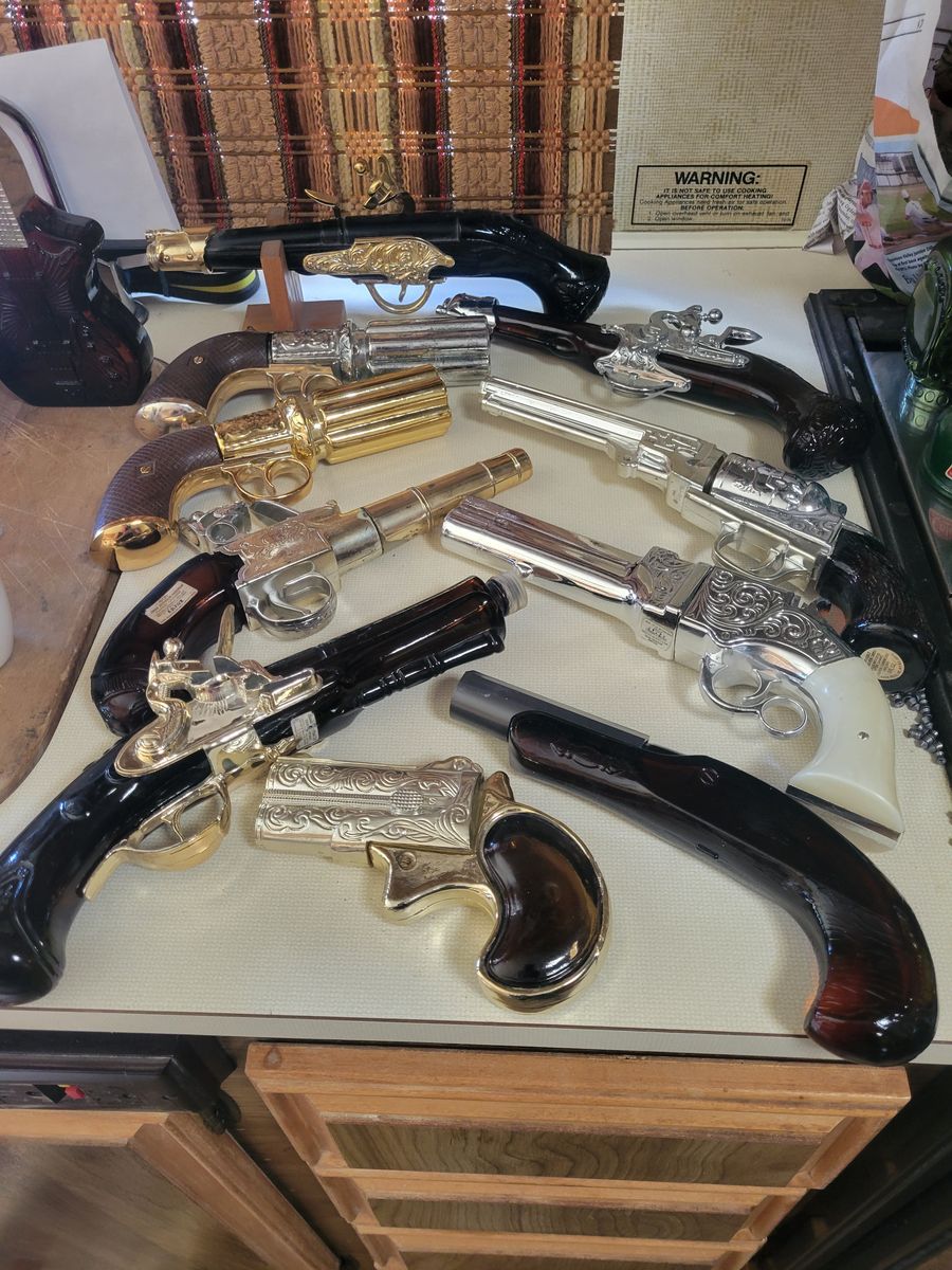 Avon gun bottles