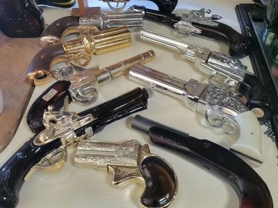 Avon gun bottles