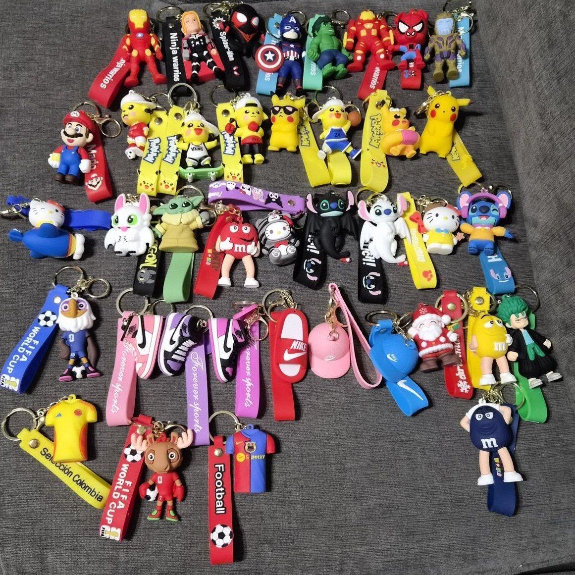 New Assorted Keychains Marvel, Nintendo, Anime, Sports, Pokémon, hello kitty, stitch, and more.