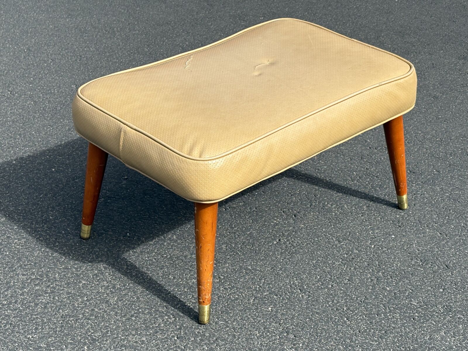 Vintage Mid Century Modern ottoman footstool. Great wooden legs