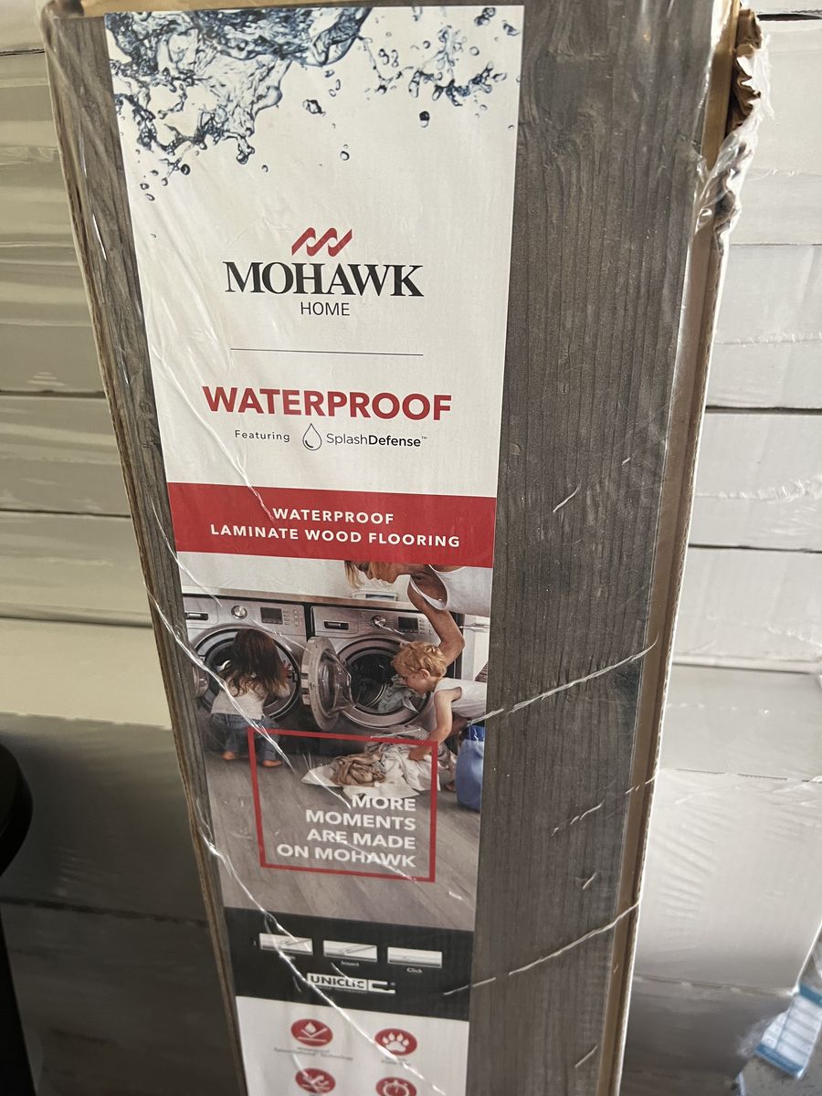 37 boxes of Mohawk waterproof laminate wood flooring, 650 square feet