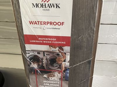 37 boxes of Mohawk waterproof laminate wood flooring, 650 square feet