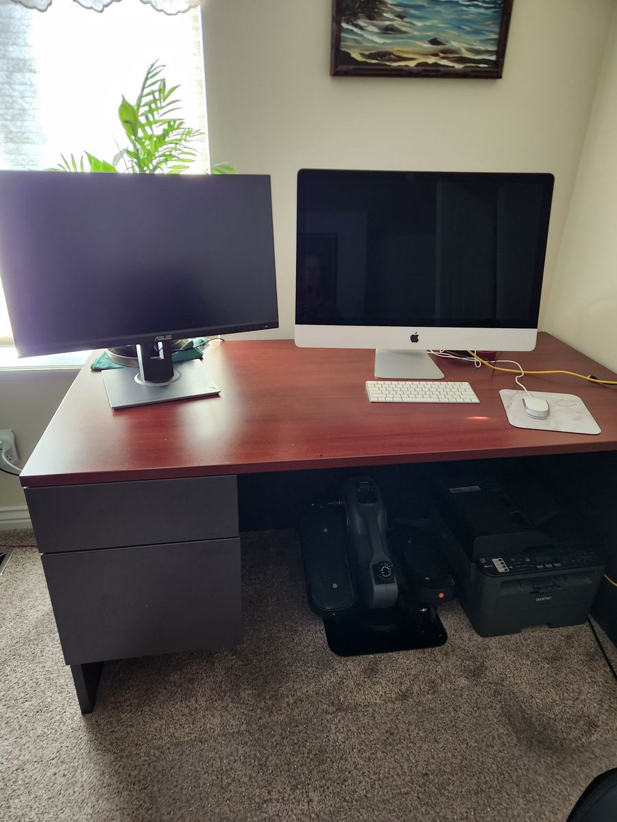 Desk, office chair, monitor, keyboard and speaker