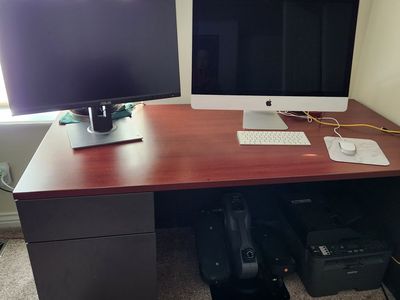 Desk, office chair, monitor, keyboard and speaker