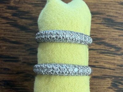 Two platinum pave rings