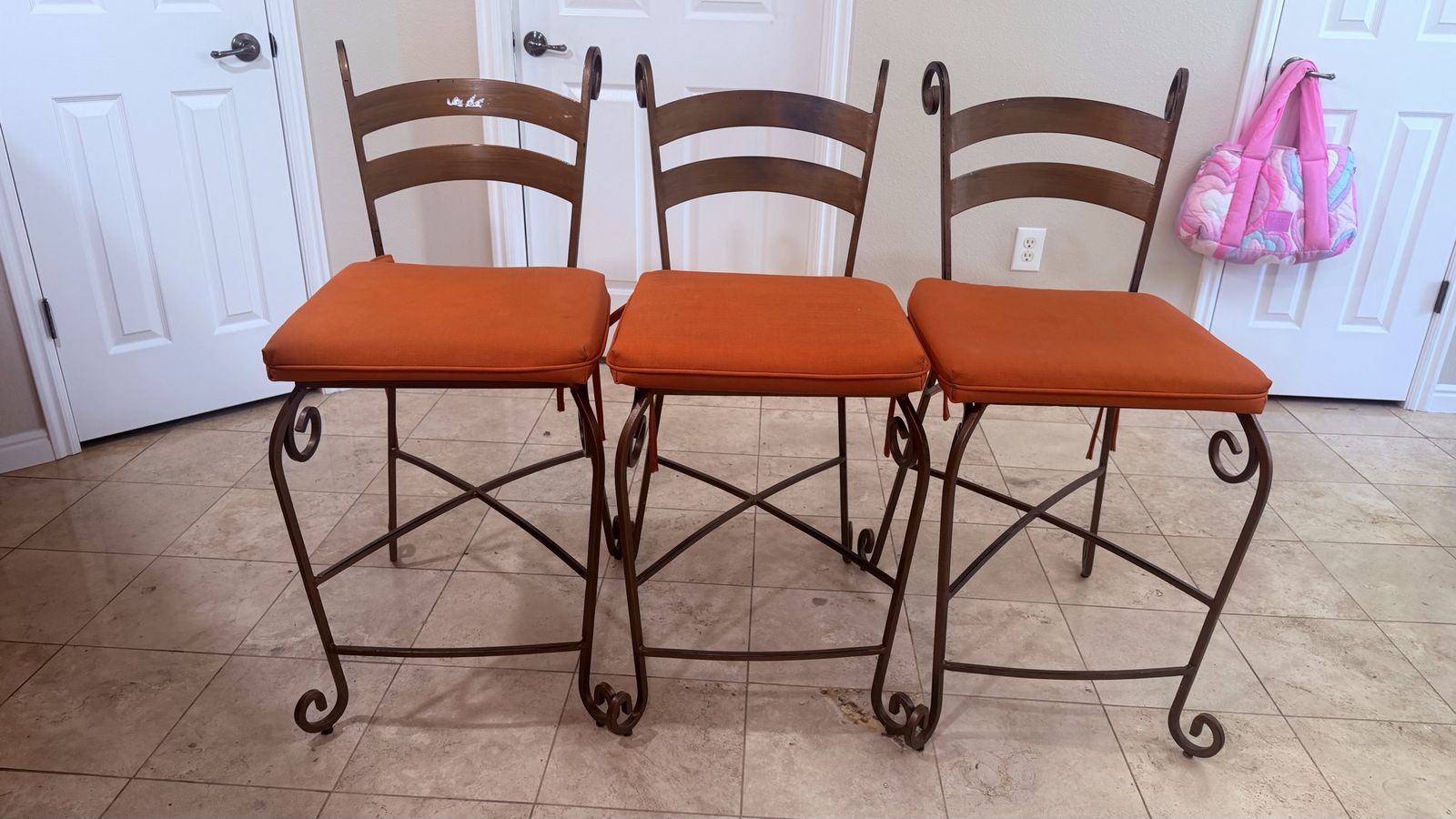 Set of 3 Wrought Iron Bar Stools with Orange Cushions