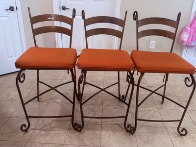 Set of 3 Wrought Iron Bar Stools with Orange Cushions