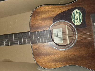 two acoustic guitars with minimal use for sale