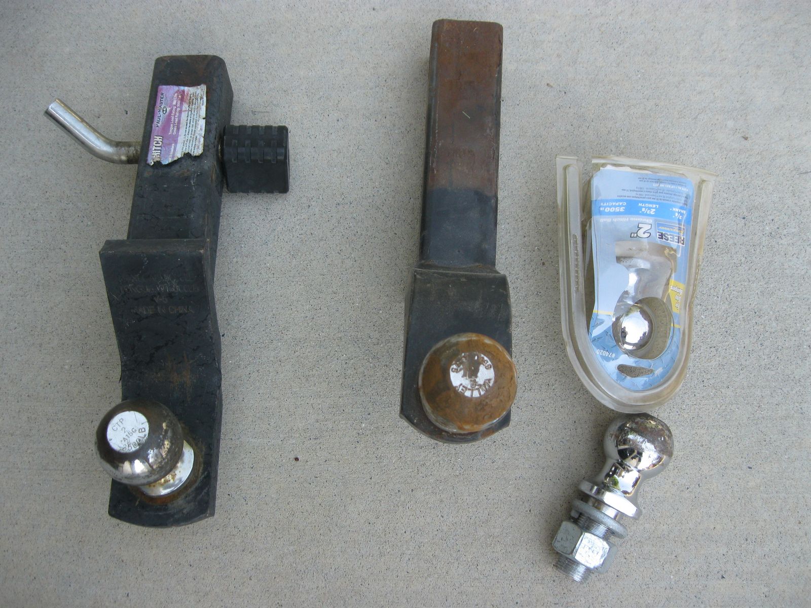 2 UNIVERSAL HITCHES WITH 2 INCH BALLS, AND I HAVE TWO 1 7/8 BALLS