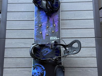 Women's Never Summer snowboard, Salomon boots, Roxy bindings, Smith helmet, Dakine travel bag. Full kit