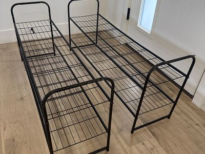 Two Black Metal 2-Tier Shoe Racks – $15 for Both