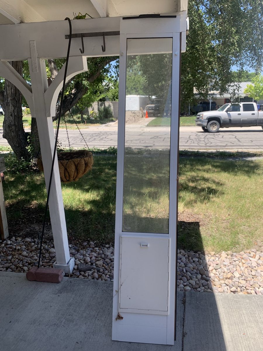 Ideal brand extra large dog door patio slider insert in great condition .