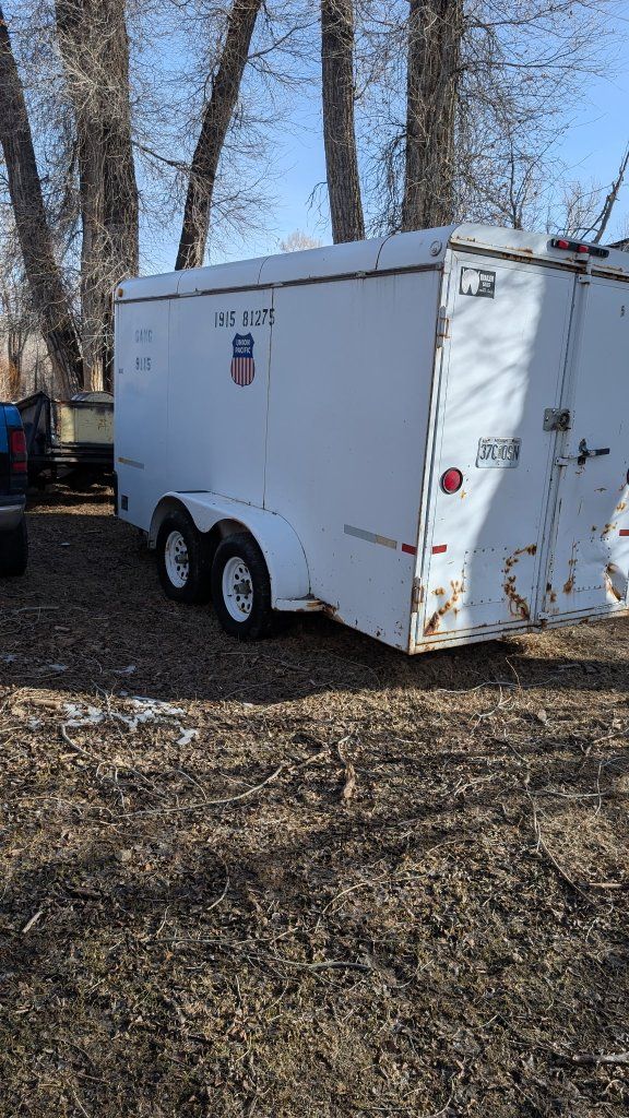 Utility Trailer - White Enclosed Cargo Trailer with Shelving