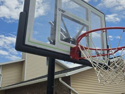 Lifetime Portable Basketball Hoop with Adjustable Height Backboard, Used