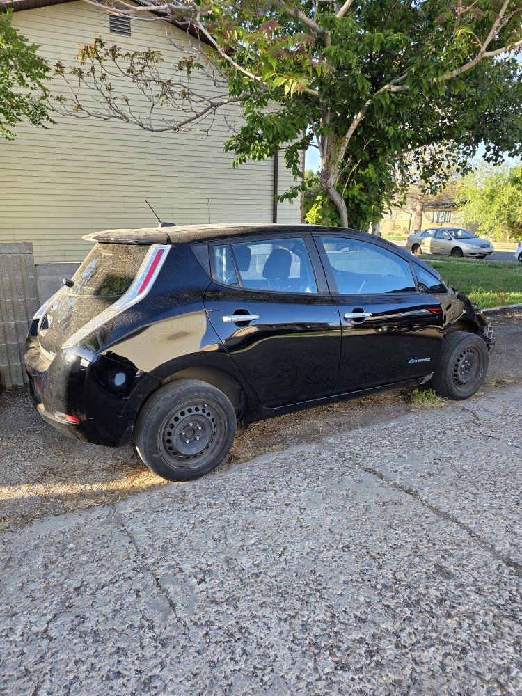 2015 NISSAN LEAF PARTS OR WHOLE CAR.