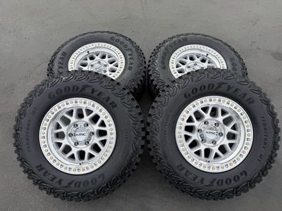 New 285/70r17 Goodyear Territory MT Silver KMC KM549 GRS 6x135 Ford F150 Expedition 6 lug 549 wheels and tires