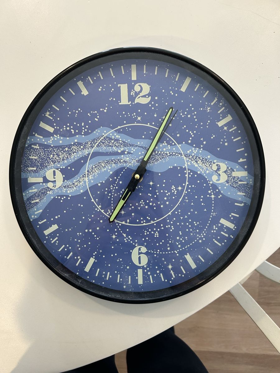 Space clock 11 inch diameter.