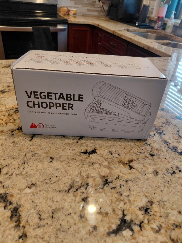 Multi-Functional One-Piece Vegetable Chopper and Cutter with Interchangeable Blades