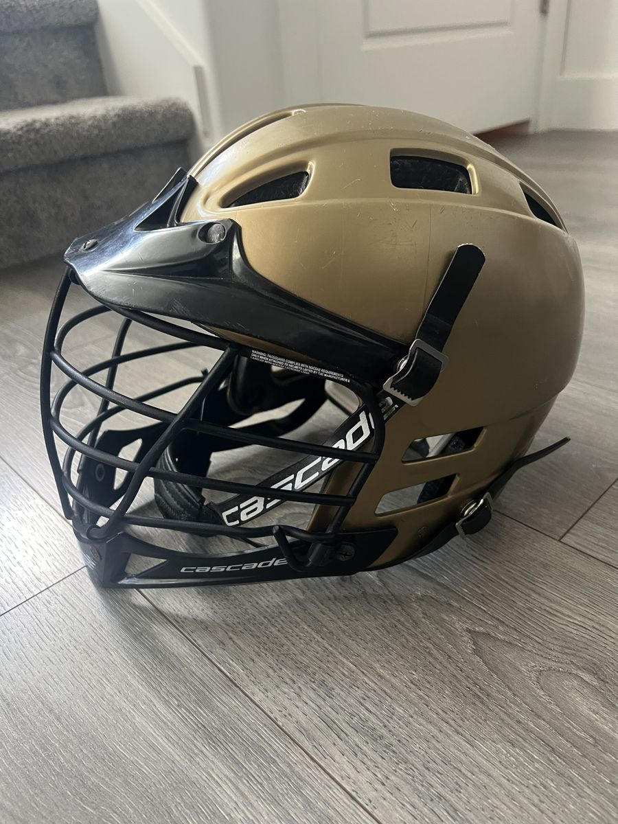 Cascade CPV Lacrosse Helmet – Size S/M – Gold & Black