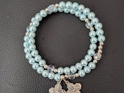 Blue Beaded Bracelet with Silver Charms