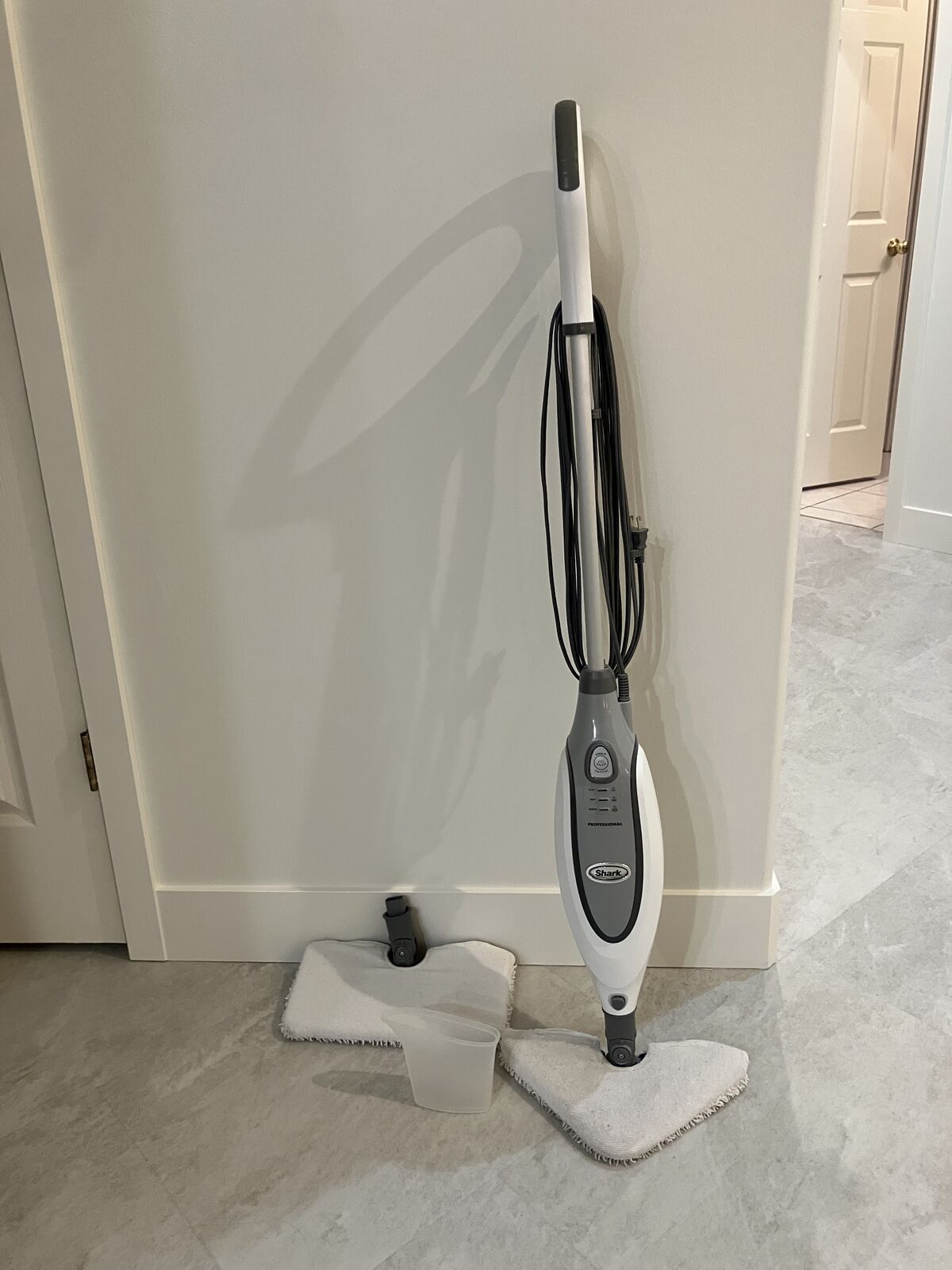Shark pocket steam mop with triangle and rectangle heads
