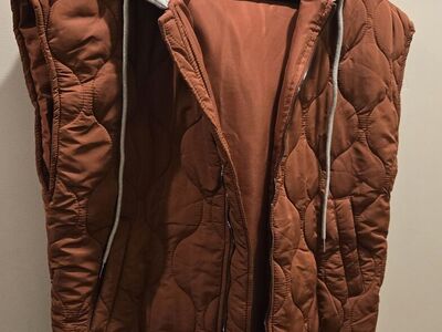 Women's Casual padded vests. Style with hood. Outdoor.