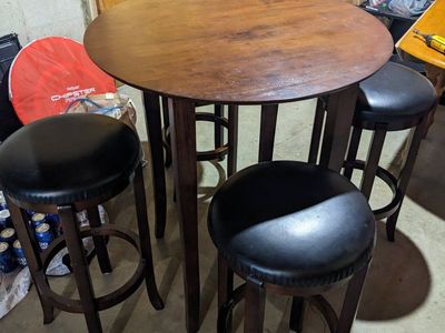 Round Pub Table with Four Black Leatherette Barstools - Dark Wood Finish