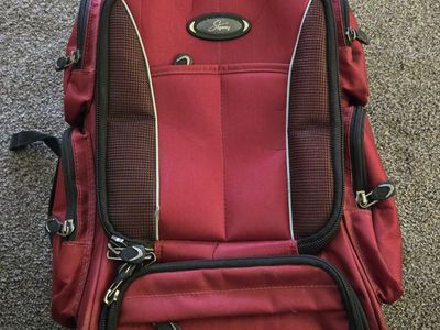 Skyway Red Rolling Backpack Luggage - Versatile Travel Bag with Retractable Handle