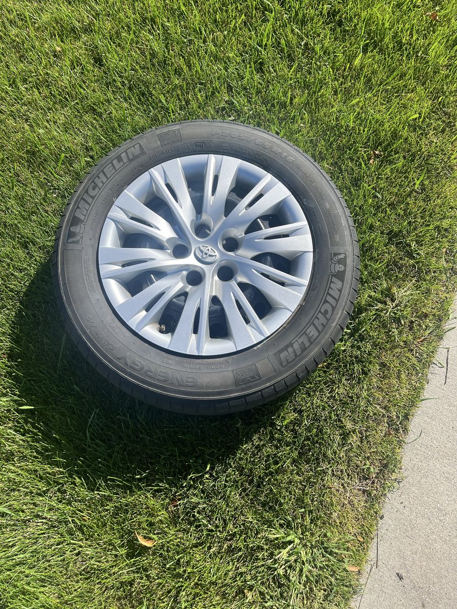 Toyota Wheel with Michelin Energy Saver A/S P205/65R16 Tire & Hubcap