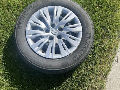 Toyota Wheel with Michelin Energy Saver A/S P205/65R16 Tire & Hubcap