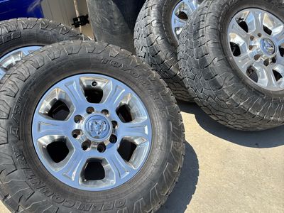 Set of 4 Toyo Open Country A/T 295/70 r 18 with chrome wheels