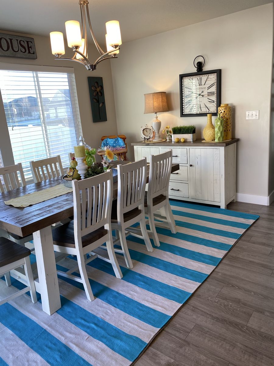 Farmhouse table, 8 chairs, and matching buffet hutch.