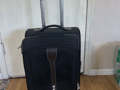 Black Carry on luggage w/wheels & handle