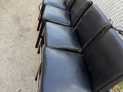 Set of 4 Black Faux Leather High-Back Bar Stools with Footrests