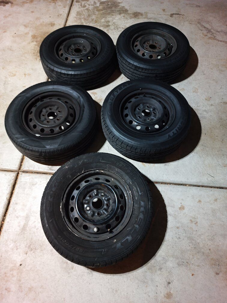 Set of 5 – 195/70R14 Tires on 14” 5-Lug Steel Whee