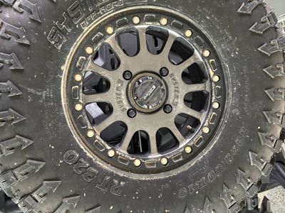 System 3 wheels and tires. 33x9.5x15. Set of 5.