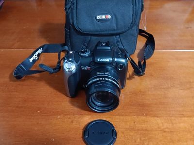Canon PowerShot SX20 IS 12.1MP Digital Camera w/20x Zoom, SD Card, Batteries AA & Carrying Case. Tested. Excellent Conditions!