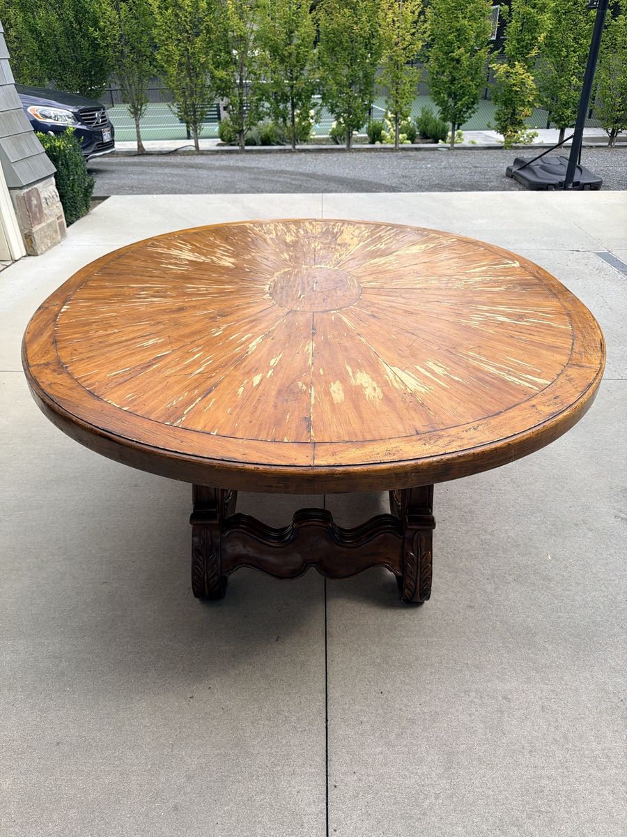 Large Oval Wooden Dining Table with Sunburst Top and Carved Base