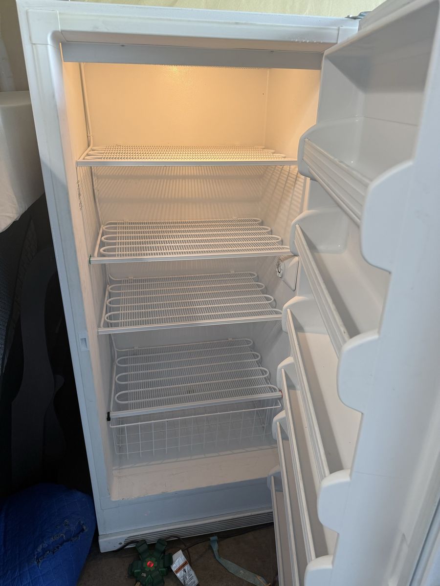 Frigidaire White Upright Freezer - Clean Interior with Wire Shelves works great its plug in for u to see $125