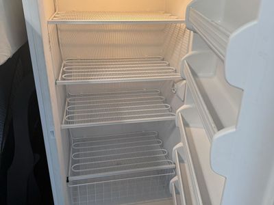 Frigidaire White Upright Freezer - Clean Interior with Wire Shelves works great its plug in for u to see $125