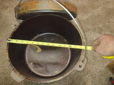 Large 14" Cast iron Dutch oven.