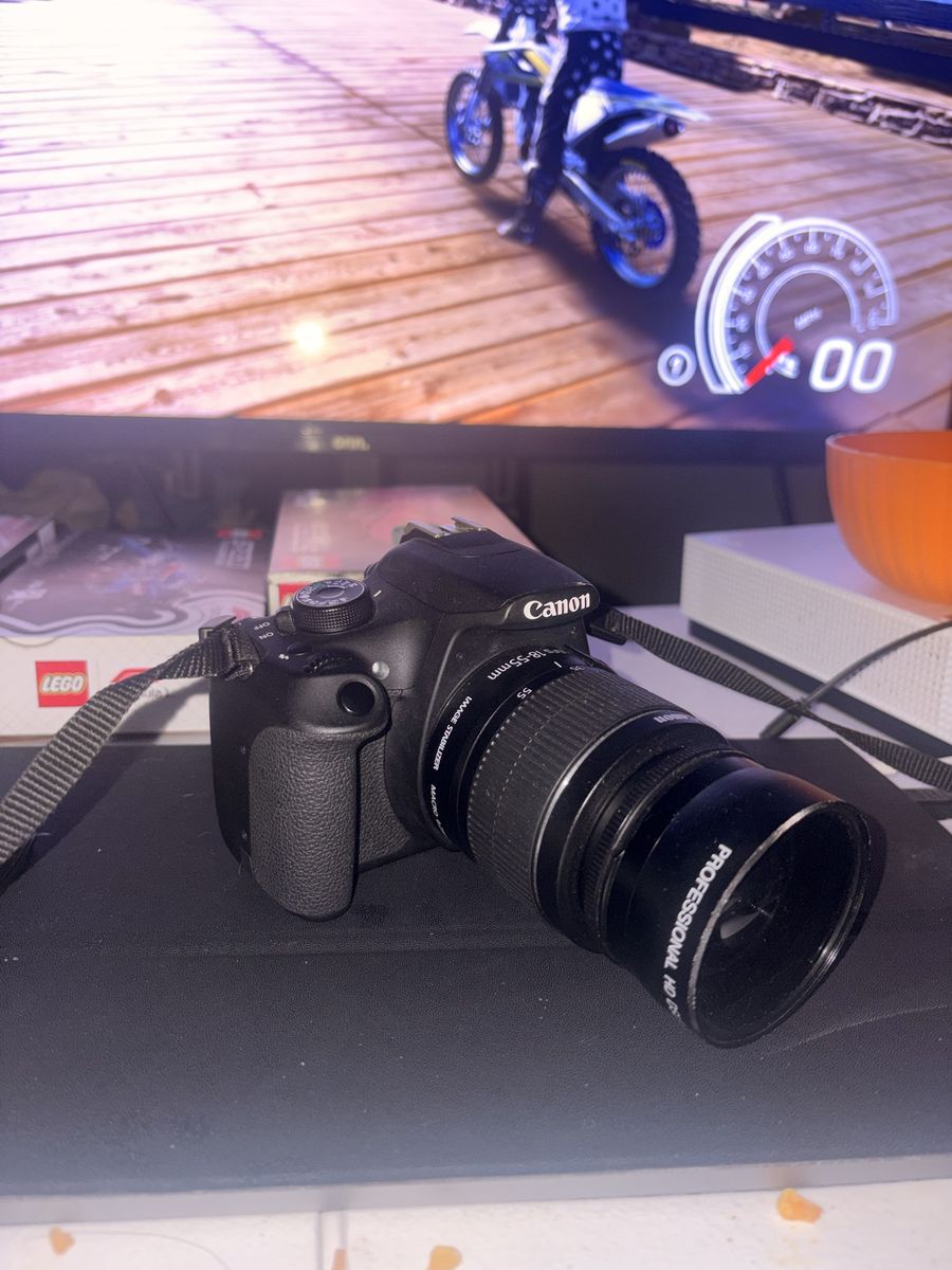 Canon EOS Rebel T5 DSLR Camera with 18-55mm Lens and Strap