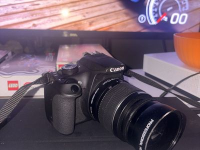 Canon EOS Rebel T5 DSLR Camera with 18-55mm Lens and Strap